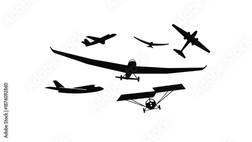 Silhouettes of various airplanes flying in formation