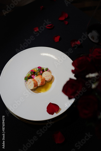 Exquisite culinary creation with food and flower accents