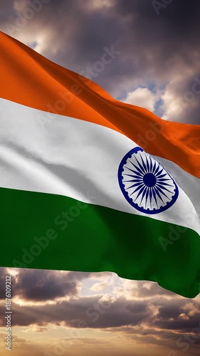 Indian flag waving in the wind with cloudy sky background, symbolizing national pride and patriotism