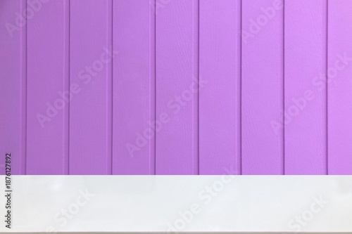 Bright purple wooden wall with white marble floor or table for product display background