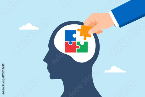 Flat illustration of hand placing puzzle piece into human head silhouette symbolizing knowledge learning problem solving cognitive development and building understanding