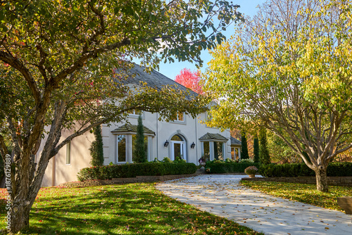 Front yard of my house with autumn leaves on a beautiful fall day in Minneapolis Minnesota USA