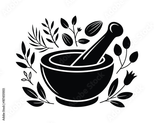 black mortar and pestle with leaves