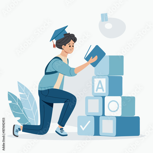 A young graduate builds a tower of blocks with letters on them while kneeling on one knee