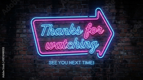 Vibrant neon sign displaying thanks for watching message on dark brick wall.