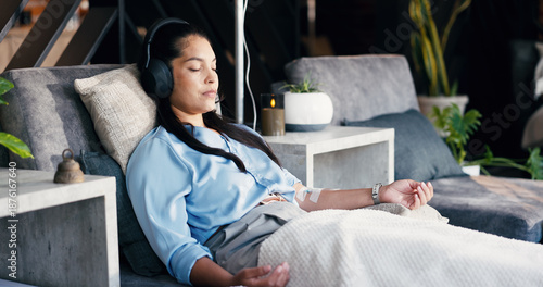 Foto Relax, woman and drip therapy with headphones in lounge for immune health, music or saline solution
