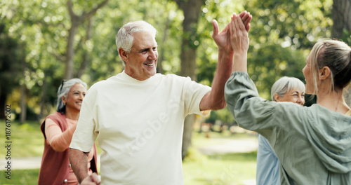 Fotografia Personal trainer, high five and old people in park with fitness, class and nature for support or help