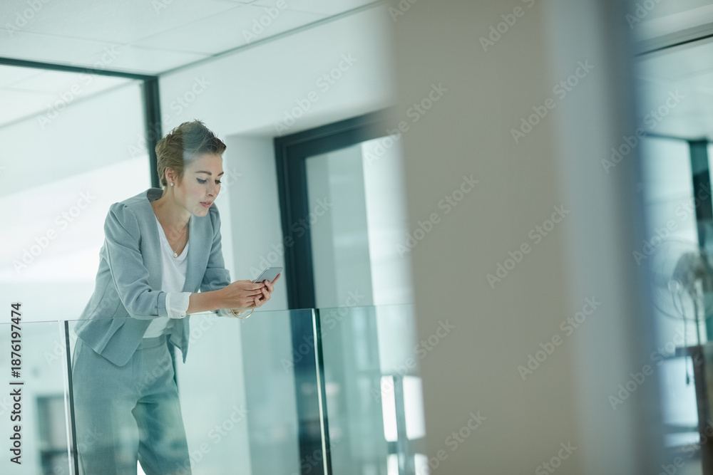Fototapeta premium Phone, reading or businesswoman in hallway for planning, email response or confirm schedule online. Review, digital to do list update or employee with mobile for notes app, admin message or internet