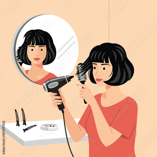 Woman Styling Short Hair With Blow Dryer