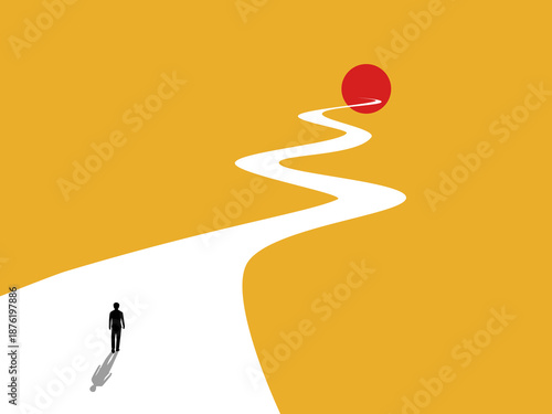 businessman walks along the path leading to goal