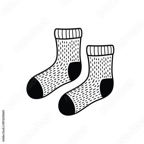 a pair of white socks with black dots and heels