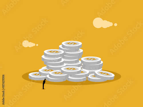 Businessmen are looking at the money pile