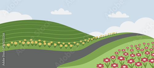 Rolling Green Hills with Winding Road and Colorful Flowers. Spring Hill in Full Bloom. Petals Over Spring Hill.