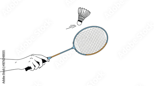 Close up of a human hand holding a blue badminton racket while hitting a white feathered shuttlecock through the air on a white background.