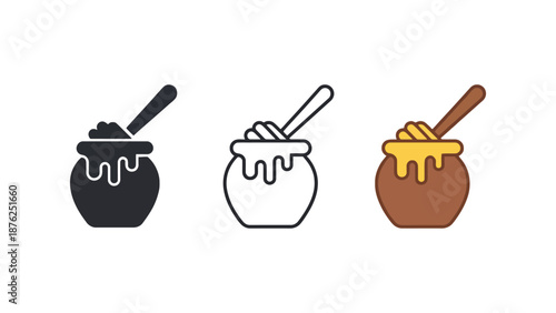 Three colorful honey pots with spoons on a white background