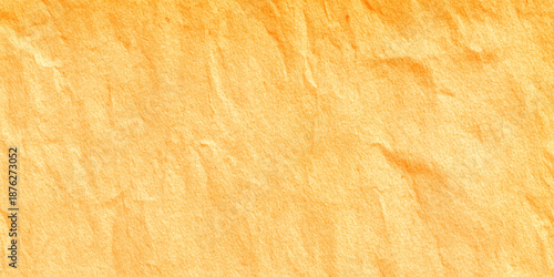 a close up of a light orange paper grain texture with a smooth and even surface