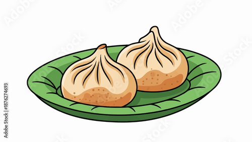 Two steaming dumplings sit on a green, textured plate