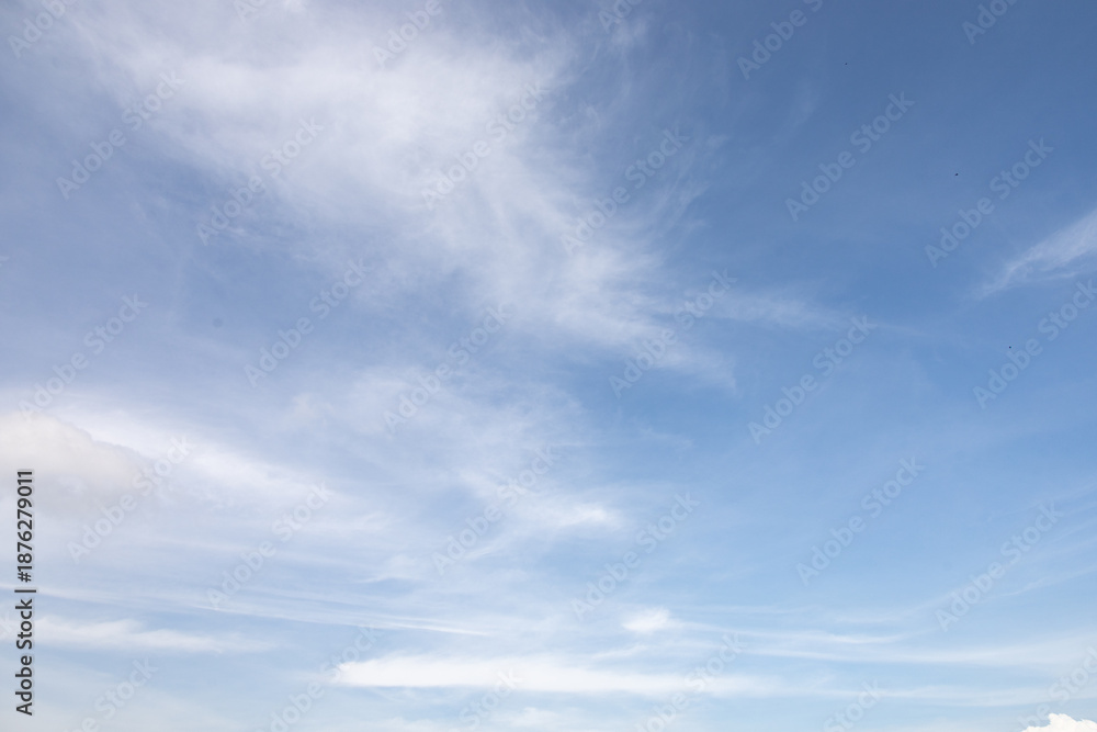 Obraz premium View blue skies clear white cloud wide sky heaven background weather climate light sun day wide sunny colourful sunbeam shine ray hope peace god glory divine purity celestial cyan sun star.