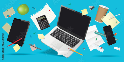 Modern digital devices and office supplies while levitating in the air