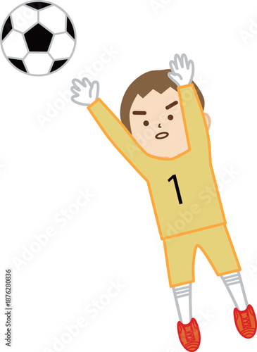 サッカーの試合で男の子のゴールキーパーが守る様子