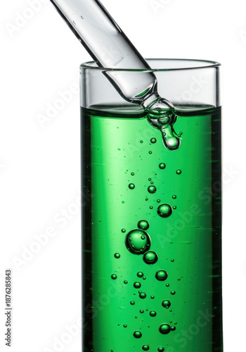 Pristine glass dropper with viscous emerald green serum and spherical air bubbles emerging from tip, on a transparent background with copy space, concept of cosmetic science purity