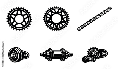 Black and white bicycle gear set with sprockets and chain on grey background