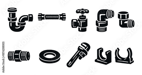 Set of plumbing tools and components on gray background