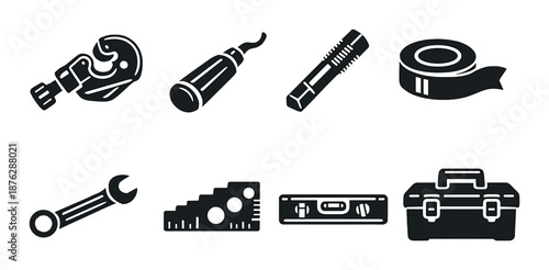 Collection of hand tool icons with wrench, screwdriver, and tape measure on gray background