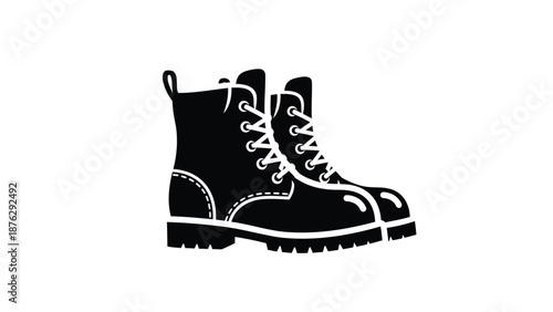 Black leather work boots with white laces and stitching on a plain white background