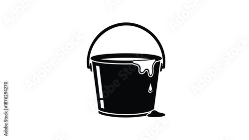 Leaking black bucket with handle on white background dripping liquid
