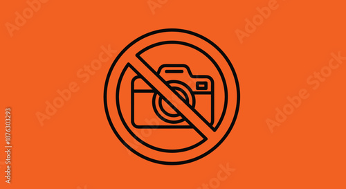 Prohibition sign with a camera silhouette on a bright orange background indicates that photography is strictly forbidden in this specific area.