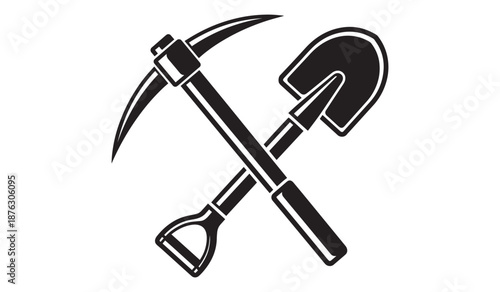 Black pickaxe and shovel crossed over each other isolated on white background