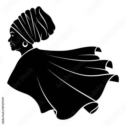 Strong silhouette of a majestic african woman wearing a flowing cape