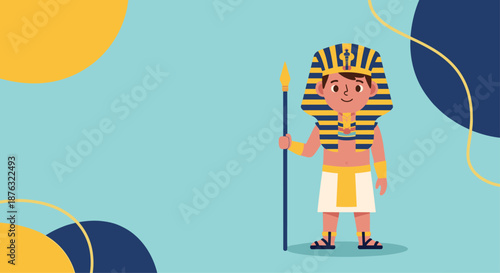 Young boy dressed as an ancient Egyptian pharaoh stands proudly with a striped headdress and a long golden spear.