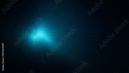 Cyan Light Burst Effect on Dark Background abstract