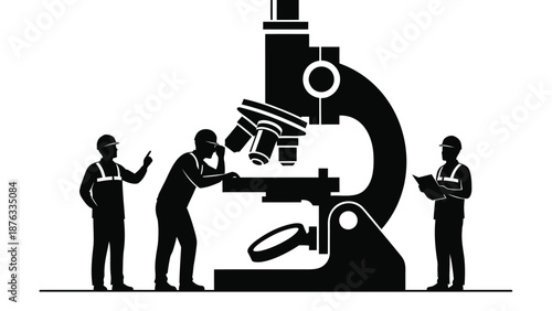 Three workers in hard hats examine and operate a large microscope in a lab setting with precision and focus on scientific research and discovery