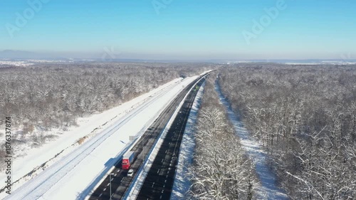 Zagreb-Karlovac-Split highway in Croatia, near Karlovac. Highway going through the snow covered landscape in winter time.