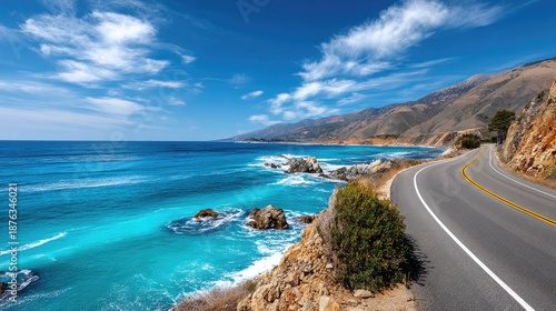 Scenic Coastal Highway with Majestic Ocean Waves and Lush Landscape Under Bright Blue Sky in Stunning Natural Setting