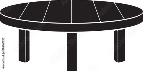 A black round wooden table with three legs