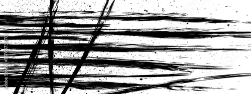 Abstract black and white grunge brush stroke background with ink splatter texture