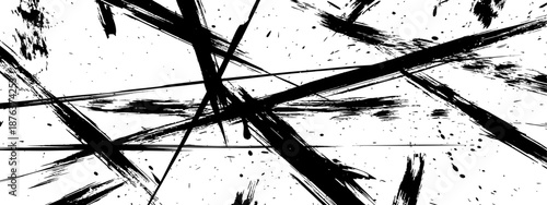 Dynamic abstract black and white grunge background with intersecting paint brush lines and splatter texture