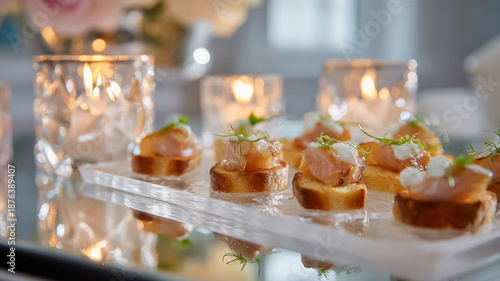 Salmon appetizers and canapes beautifully arranged on a tray, ready for serving at a sophisticated event or celebration