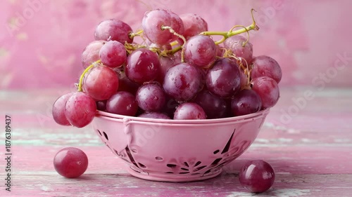 A bowl of grape on wooden table