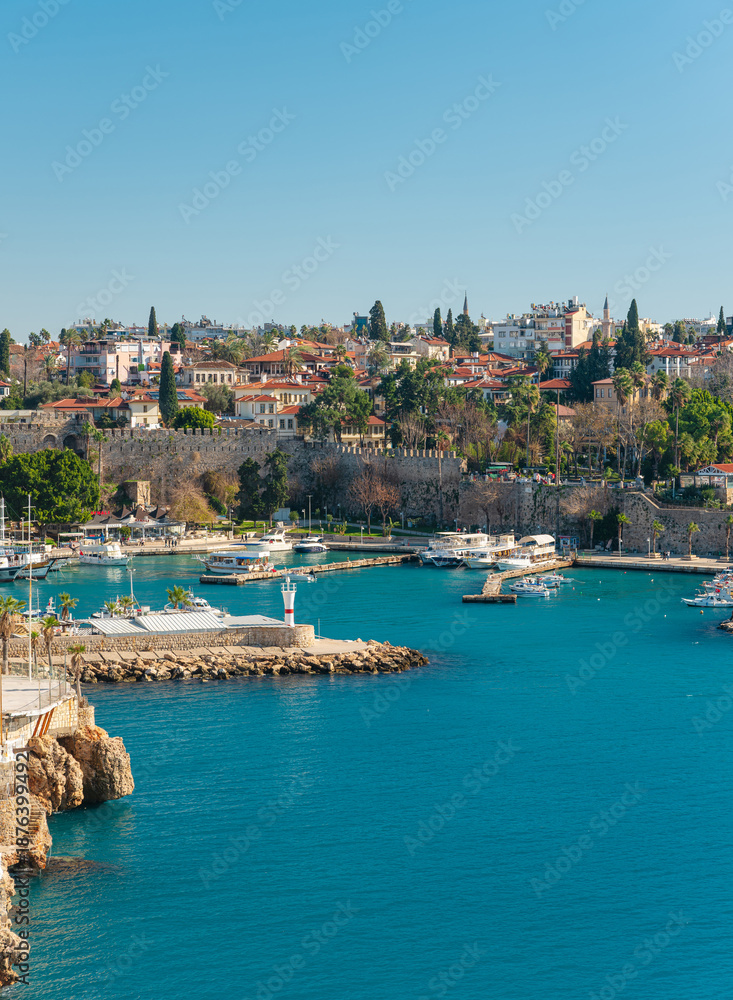 Fototapeta premium View of the Old Town Antalya Marina and tour boats in Kaleici