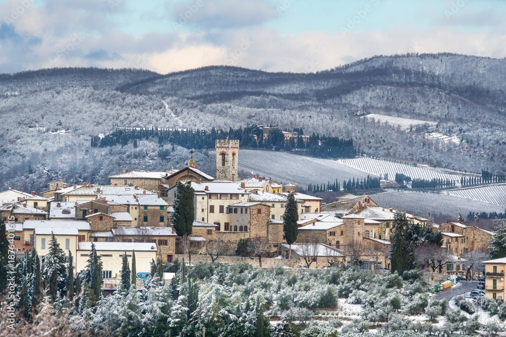 Obraz premium Winter Panorama of Radda in Chianti Covered in Snow, Tuscany, Italy