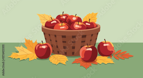 Wicker basket overflowing with ripe red apples surrounded by golden autumn maple leaves on a green background.