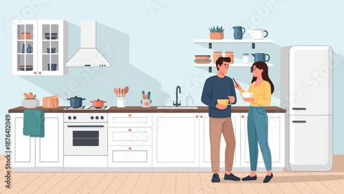 A couple shares breakfast in a bright, modern kitchen