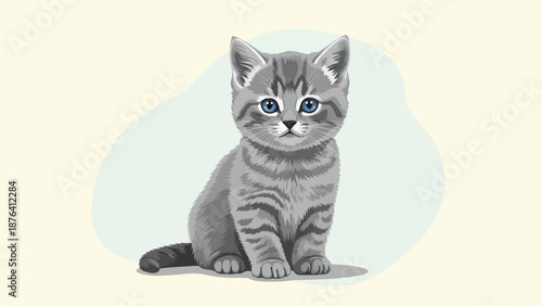 A cute, fluffy grey tabby kitten with bright blue eyes sits looking forward