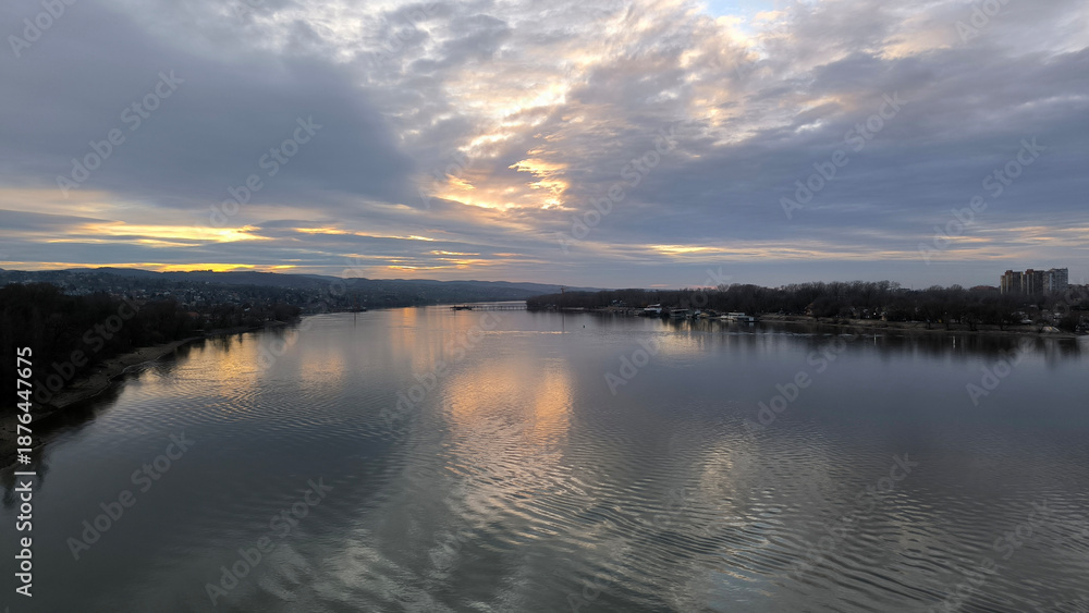 Fototapeta premium colorful sky at the sunset over the Danube river in Novi Sad reflected on the water surface