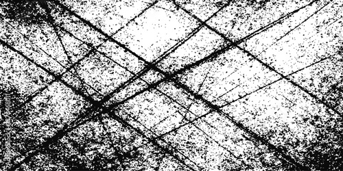 Old rusty grunge metal texture features a cracked rough surface with a weathered pattern of dry earth and gray stone material on an ancient road